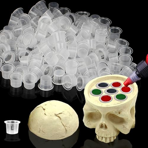 Rayyl Tattoo Ink Holder with 100Pcs Tattoo Ink Caps Large 15MM include 7 Holes Skull Head Stand Tattoo Pigment Holder Resin Ink Cup Caps Holder for Makeup Eyebrow Tattoo Ink Tool Tattoo Kit...