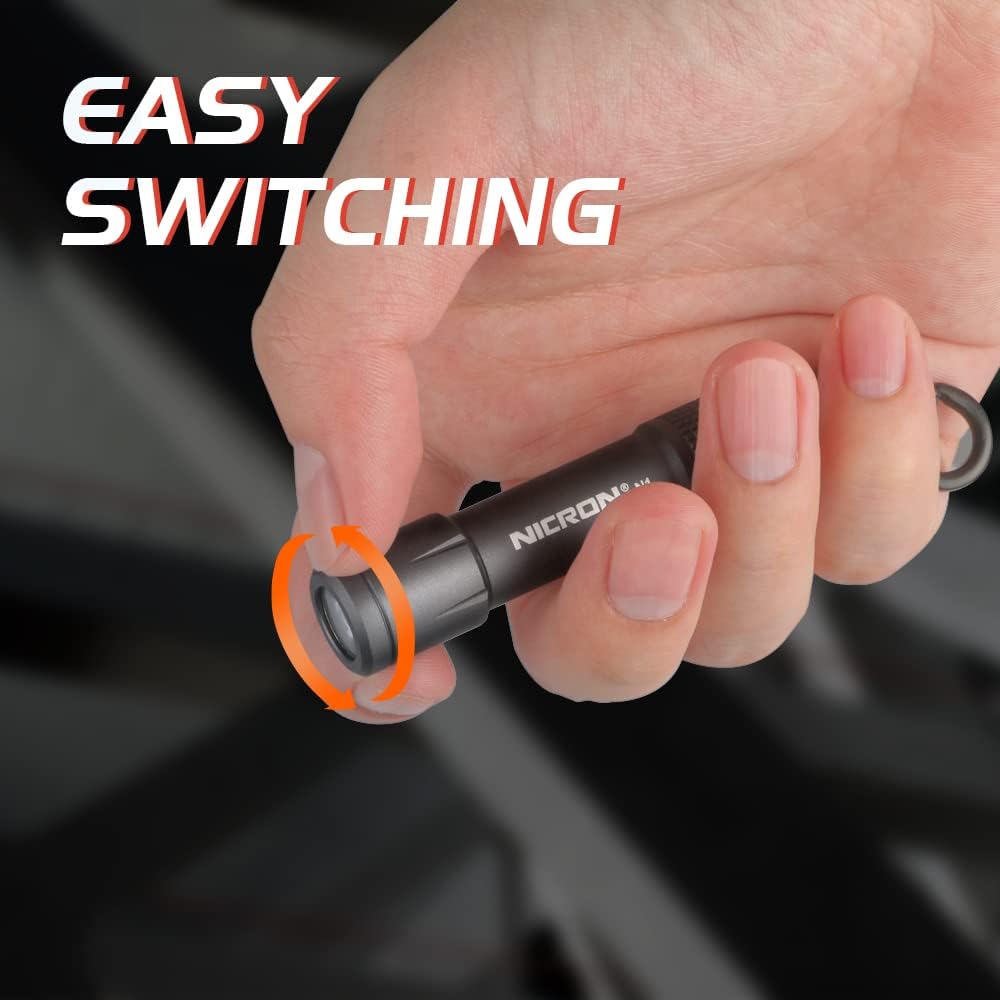 Hand demonstrating twisting the NICRON N1 flashlight head