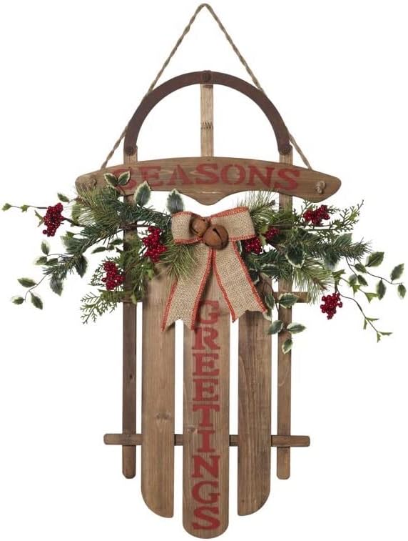 Gerson 27" H Wood Hanging Sled Seasons Greetings w/PVC Accents, Bow & Bells