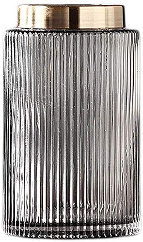 Vase en verre transparent MU idéal sur une table noire de salon familial