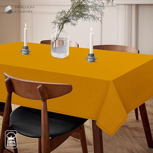 HEIRLOOM COMFORT Mustard Yellow Cotton Table Cover, 60x84 Inch, Fits 6-8 Seats, Soft, Durable, Washable, Wrinkle Resistant, Rectangle Table Cloth for Summer Gatherings, Festive Meals, Dining Decor by HEIRLOOM COMFORT - Used condition - Image 3