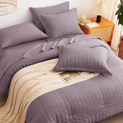 Image of CozyLux Oversized Queen Comforter Set with Sheets, 7 Pieces 98 inchx98 inch Dusty Purple Seersucker Bed in a Bag, Soft Grayish Purple Bedding Sets with Down Alternative Comforter, Sheets, Pillowcases & Shams