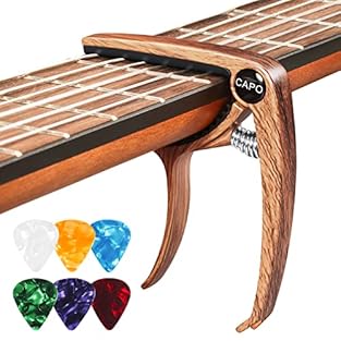 Capo for guitar: 1 capo made of high-quality metal, with 6 pieces guitar picks in different colours, a good capo makes it easier to make, capo size 7.5 x 9 x 1.3 cm, pick size 25 x 30 x 0.71 mm. Unique design: the capodasta is designed with U-shaped ...