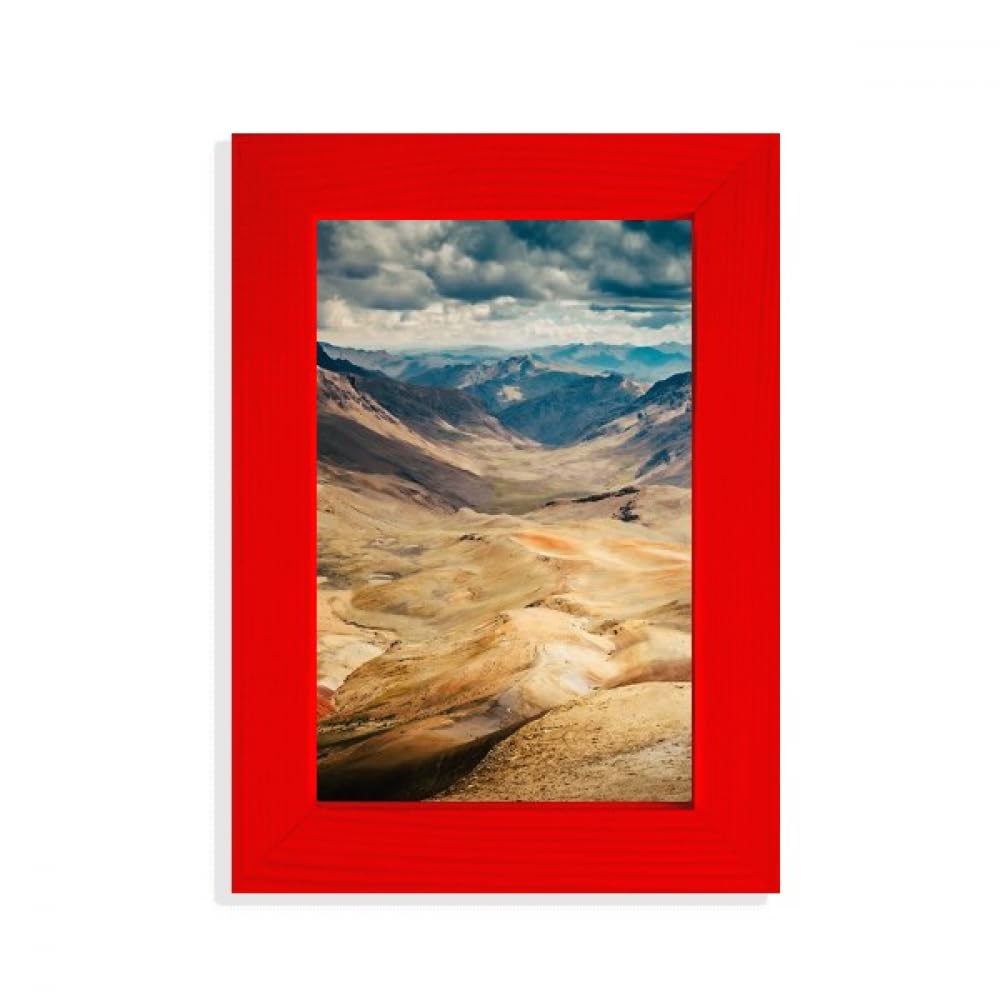 Cadre photo rouge ciel de montagnes pour décorer un salon chaleureux