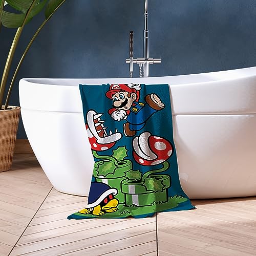 Asciugamano ufficiale Nintendo Super Mario per bambini, super morbido al tatto, design salto, perfetto per casa, bagno, spiaggia e piscina, taglia unica, 70 cm x 140 cm - Gadget - Immagine 2