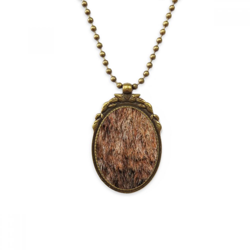 Collier vintage pendentif ours plume conception abstraite laiton - 4