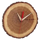 Tree o’clock: Die Wanduhr ist circa 18cm hoch und wirkt circa 185g, mit Sekundzeiger und natürlichem Ziffernblatt
