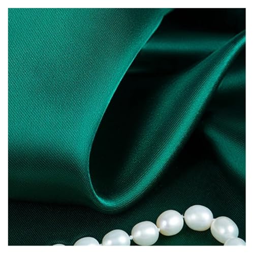 Tissu satiné doux et fluide coloris vert foncé pour doublure de boîte et mode