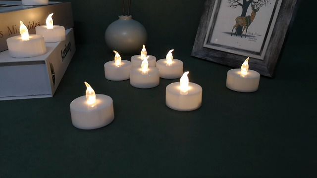 Image of Tea Lights - 50 Pack Flameless LED Candles - 200 Hour Battery Operated - Realistic Flickering - Warm White Light - Perfect for Halloween & Seasonal Celebrations