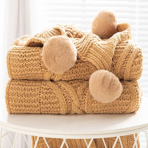 4. Tonrew Chunky Knit Blanket with Pom Balls