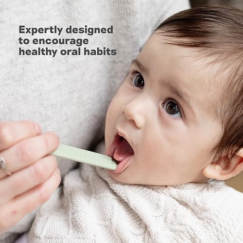 Image of ezpz Baby-Led Toothbrush + Tongue Depressor Dual Pack (Blush) - 100% Silicone Toothbrush + Silicone /Stainless Steel Tongue Depressor - Helps Set-up Infants for a Healthy Oral Care Routine