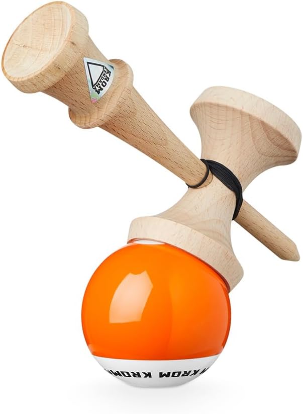 Kendama in action, showing the tama about to be caught on the spike