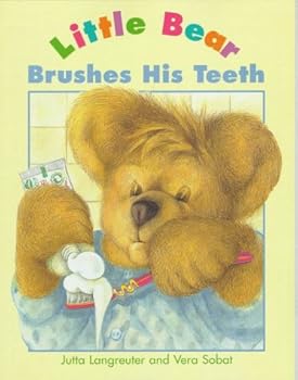 Paperback Little Bear Brushes His Teeth Book