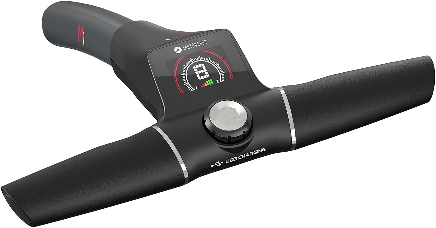 Close-up view of the Motocaddy M1 handle, showing the LCD screen, control dial, and USB charging port.