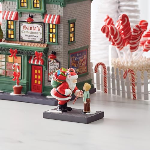 Department 56 6013403 Christmas In The City Village Accessories Sharing The Sweetness Santa Figurine- Hand Crafted Porcelain Mini Figurines Christmas Village Home Decor Collection thumb #1