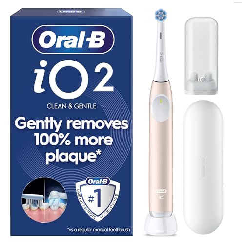 Oral-B iO2 Electric Toothbrush, 1 Gentle Care Toothbrush Head, 1 Travel Case, 1 Travel Refill Holder, Toothbrush for Adults (Calm Pink), Designed by Braun, 2 Pin Plug