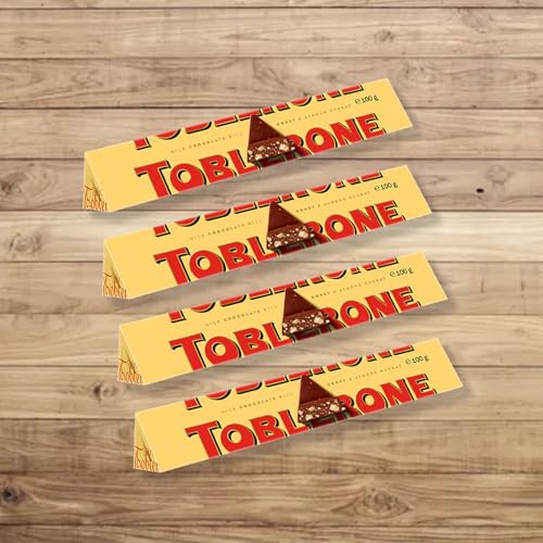 Image of COCOCART Toblerone Chocolate Bar,Enjoy Toblerone,The Iconic Triangular Chocolate From Switzerland (Pack Of 4,Milk),100 Gram