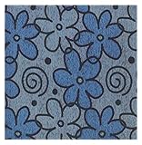 Una fantasia fiorata allegra e dai colori vivaci creata direttamente in tessitura con la lavorazione jacquard e con l'utilizzo di filati di ciniglia.
