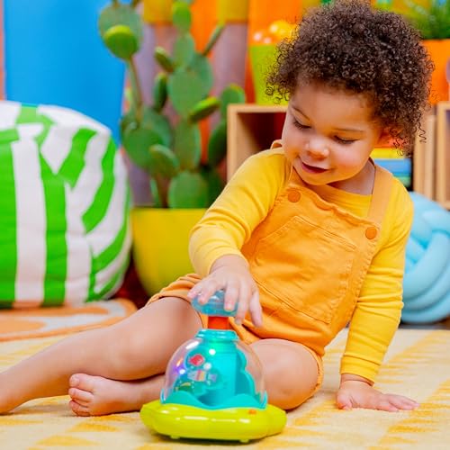 Bright Starts, 10042 Press & Glow Spinner, Musikspielzeug Kreisel mit blinkenden Lichtern und Melodien, fördert die Motorik und das Verstehen von Ursache und Wirkung, 19.05 x 17.78 x 21.59 cm