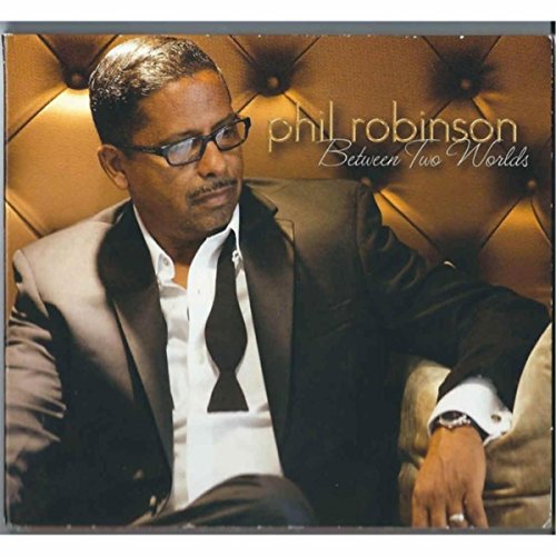 Amazon MusicでPhil RobinsonのBetween Two Worldsを再生する