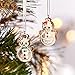 SWAROVSKI Gingerbread Couple Ornament, for Hanging on a Tree or for Display, Brown Crystal with Black, Green, and Red Accents, Part of The Swarovski Joyful Ornaments Collection