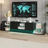 Dimensiones generosas: este moderno mueble de TV con iluminación LED mide 200 cm de largo, 35 cm de profundidad y 45 cm de altura, proporcionando un espacio cómodo para tu televisor y tus equipos multimedia. Di adiós al lío y disfruta de un espacio de entretenimiento limpio y organizado.