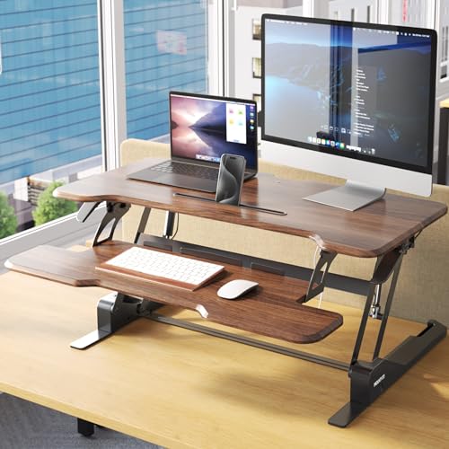 Image of Mount-It! Large 38 Inch Standing Desk Converter, Sit Stand Desk Riser for Dual Monitors with Keyboard Tray, Height Adjustable Desktop Workstation, Easy Lift Gas Spring, Rustic Walnut Brown