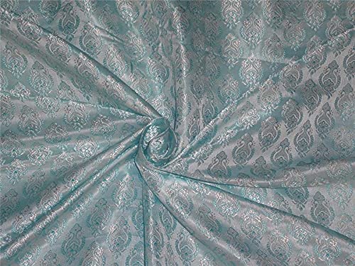 Tissu brocart de soie bleu et ivoire pour donner vie à vos rêves de mode