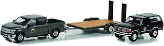 Greenlight 31150-C Hollywood Hitch & Tow Series 11 - Yellowstone 2018 F-150 Montana Livestock Association with 1992 Bronco Montana Livestock Association on Flatbed Trailer 1:64 Scale