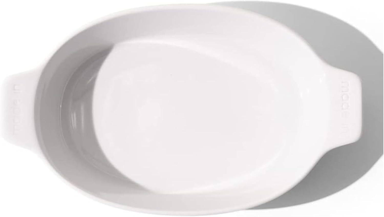 Made In Cookware | Oval Baking Dish | Navy Rim | Handcrafted Porcelain | Professional Bakeware | Crafted in France