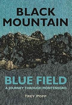 Paperback Black Mountain, Blue Field: A Journey Through Montenegro Book
