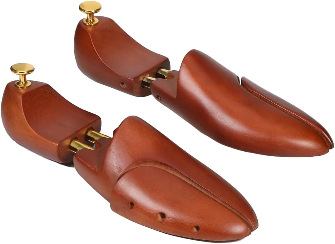 Unisex adjustable wooden shoe trees with spring-loaded toe cap protection to prevent wrinkling of the toe.