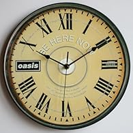 Unique Hand Crafted 12" Vinyl Record Wall Clock Featuring the CD ART from BE HERE NOW Fitted with a quality Quartz clock mechanism and hanger (Requires 1 AA battery) Select your favourite hands - Gold is standard See our other listings