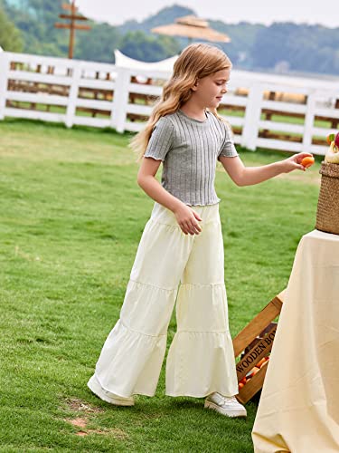 Image of WDIRARA Girl's Flowy Elastic High Waist Loose Ruffle Hem Beach Wide Leg Palazzo Pants