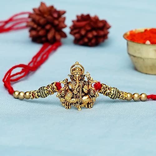 Image of eCraftIndia Pack of 20 Golden Religious Designer Ganesha Rakhi for Brother Bhaiya Bhai | 20 Best Bro Ever Fridge Magnets | Roli Chawal Pack | Raksha Bandhan Rakhi Gift Set