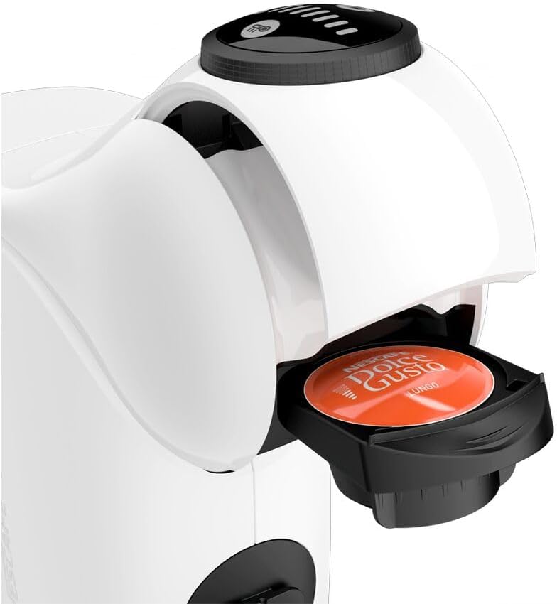 NESCAFÉ DOLCE GUSTO Genio S machine with various coffee pods and drinks