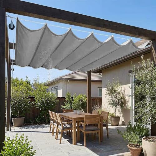 Toldo vela rectangular gris oscuro contra el sol en terrazas 2