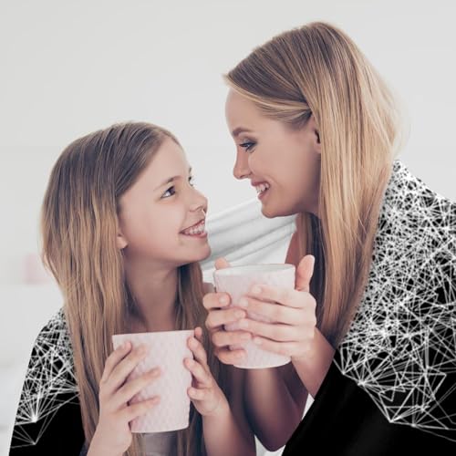 Couverture douce line art pour vos soirées cocooning sur le canapé