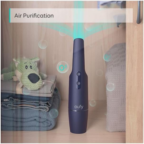 eufy HomeVac H11 Pure with crevice tool cleaning candy from a sofa