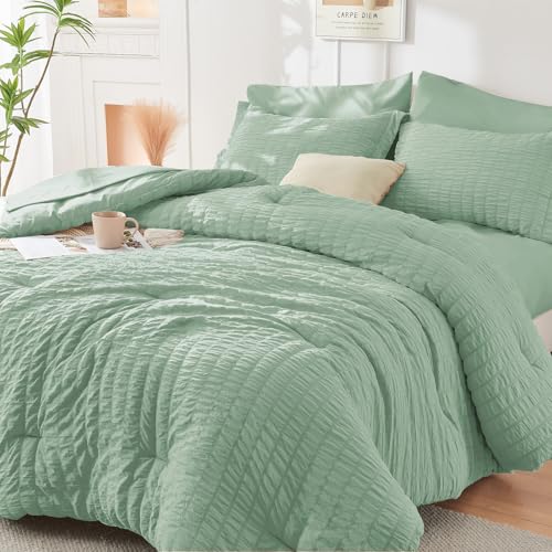 Image of HYMOKEGE Sage Green Oversized King Comforter Set Seersucker 7 Pieces, All Season Luxury Bed in a Bag for Bedroom, Bedding Set with Comforter, Sheets, Pillowcases & Shams