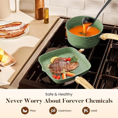 Various pots and pans from the Kitchen Academy set, highlighting the Bakelite handles and induction base.