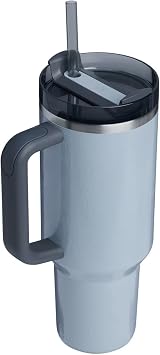 كوب STANLEY Quencher H2.0 بمقبض وقشة 40 أونصة | غطاء Flowstate ثلاثي الأوضاع | حامل أكواب متوافق مع السفر | كوب معزول من الفولاذ المقاوم للصدأ | خالٍ من مادة BPA | فضي مطروق