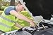 Roadside Emergency Car Kit with Jumper Cables - Car Essentials - Travel First Aid Kit, LED Flash Light, Rain Coat, Glow Stick, Safety Vest & More Ideal Emergency Kit for Car, Truck Or SUV (Large Kit)