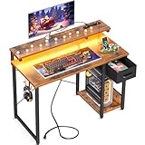 AODK Escritorio para juegos con luces LED y toma de corriente, escritorio reversible con estante para monitor y gancho para auriculares para oficina