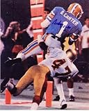 ANTHONY CARTER OAKLAND INVADERS USFL ACTION SIGNED 8x10 - Autographed College Photos