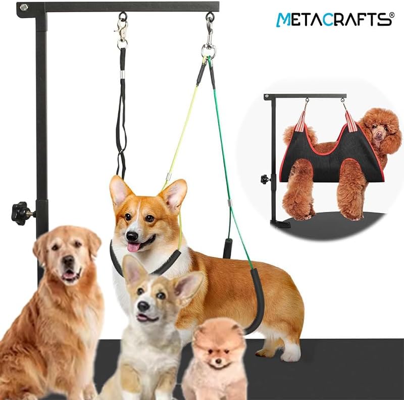 A small poodle-type dog suspended in the Metacrafts grooming hammock, attached to the grooming arm.