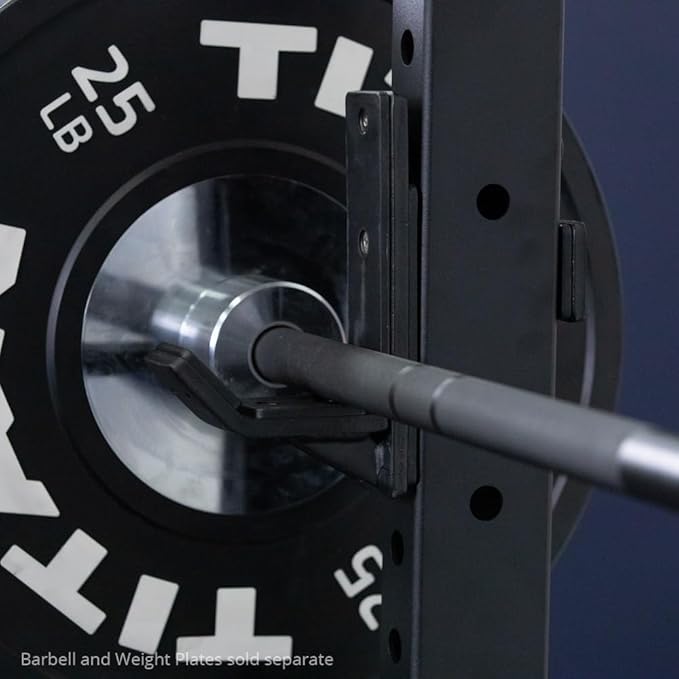 The Titan Fitness T-3 Series Power Rack is a heavy-duty cage designed for weightlifting and strength training. It has a weight capacity of 1,100 pounds, making it suitable for a wide range of users and exercises. The rack is constructed from high-quality steel, providing durability and stability during intense workouts.