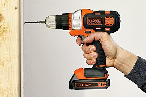 Person using the drill driver attachment