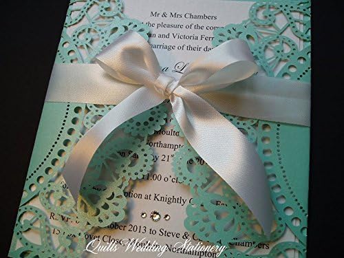 Lace Effect Wedding Invitation in Tiffany Blue wrapped with White Satin Ribbon. Embellished with Swarovski Crystals.