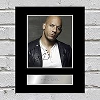 Vin Diesel Signed Mounted Photo Display Professionally mounted 10x8 inch Photo display with caption. Perfect gift, ready to be framed. High quality photographic print applied to a 1.5mm thick black bevelled mount. The autographs are Digitally pre-pri...